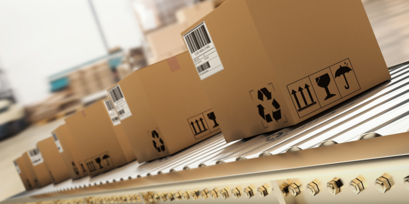 cardboard boxes on a conveyor belt 3PL distribution services
